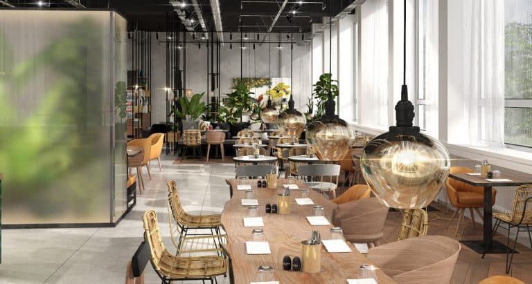 Der öffentliche Bereich des NinetyNine Wuppertal mit natürlichen Materialien und viel Grün. Bild: Centro Hotel Group