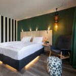 Das Achat Hotel Reilingen Walldorf, ist eines von zwei Häusern, in welchem man das neue Design mit Elementen der Markenfarbe Grün bereits erleben kann. Bild: Achat Hotel Reilingen Walldorf