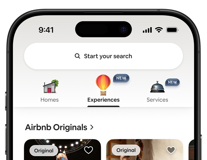 Ausschnitt eines Handydisplays mit der neuen Airbnb-App