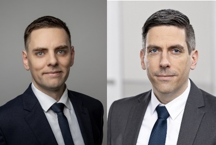 Zwei Männer in Anzug und Krawatte